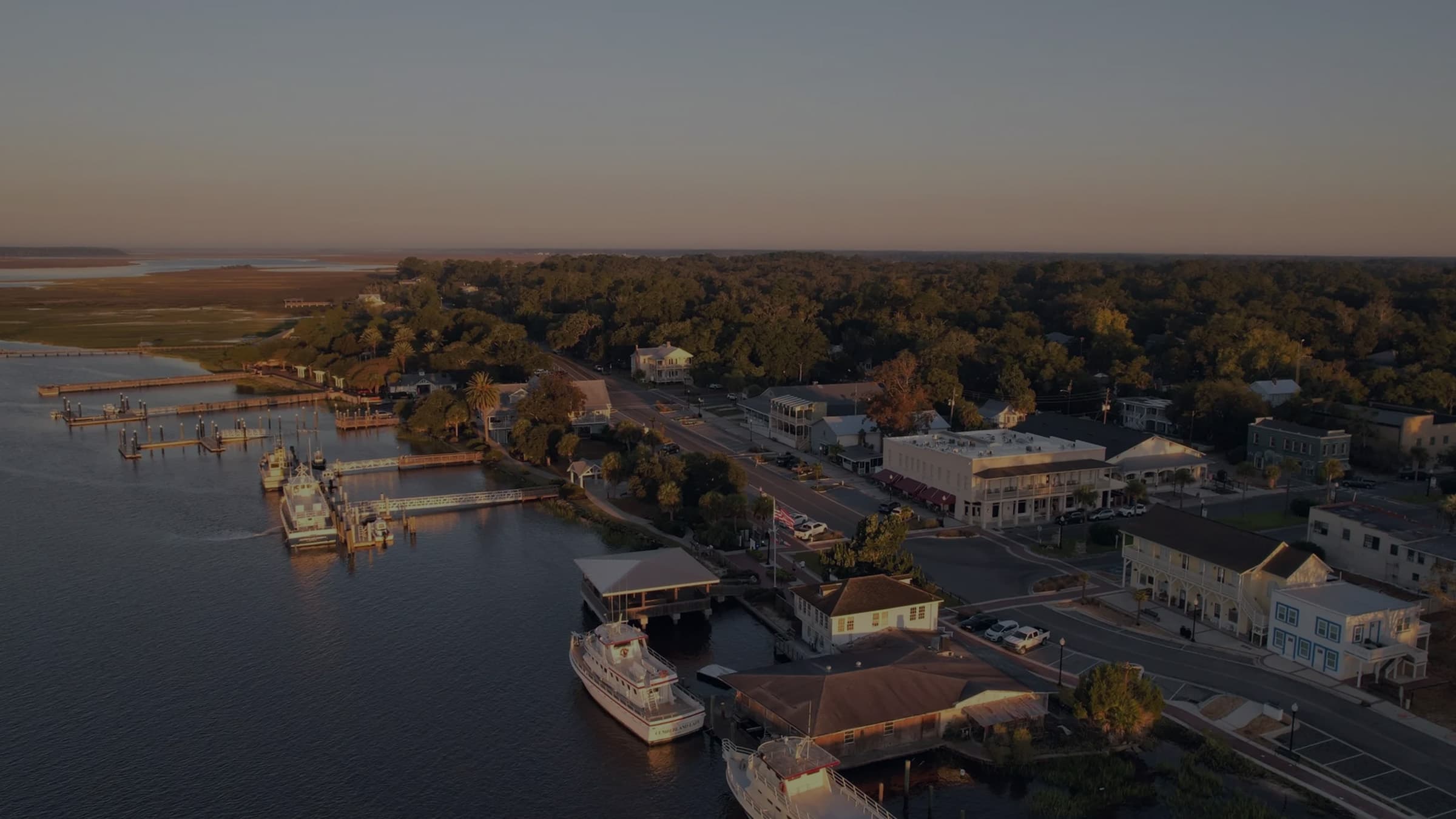 Downtown St. Marys, Georgia waterfront with marina, historic buildings, and riverfront views near Golden Isles Junk Removal service area.